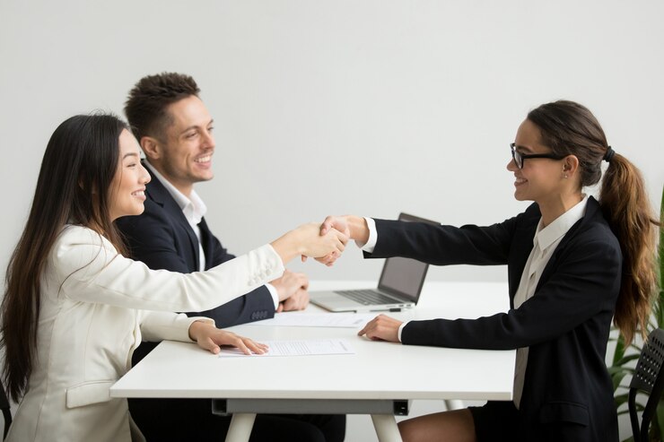 smiling diverse businesswomen shake hands group meeting deal concept 1163 4686